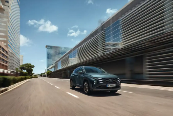 Hybrids surge as drivers hesitate on full EV leap